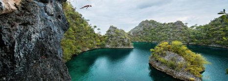 Cliff Diving Into An Indonesian Paradise